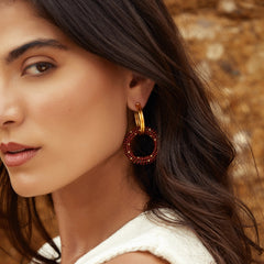 Aretes Entrelazados tejidos dobles terracota en modelo