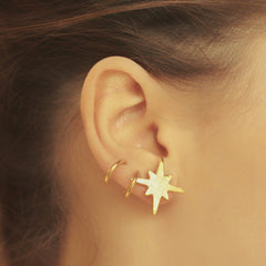 Aretes de estrella con 8 puntas vista real