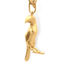 Cadena con tucán vista lateral