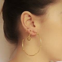 Candongas con resortes grandes vista real