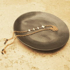 Cadena para gafas con estrellas de 8 puntas vista real