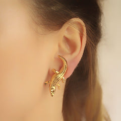 Aretes de cocodrilo vista real
