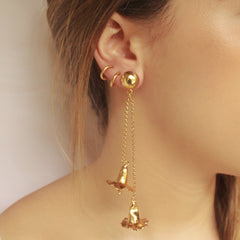 Aretes largos con flor de palisandro vista real